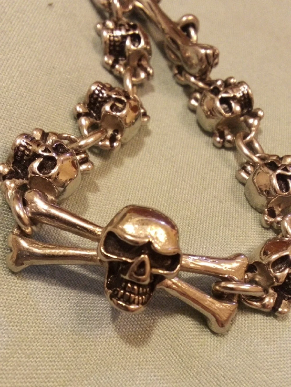 Skull & Crossbones Chunky Bracelet in Metallic Gold Tone